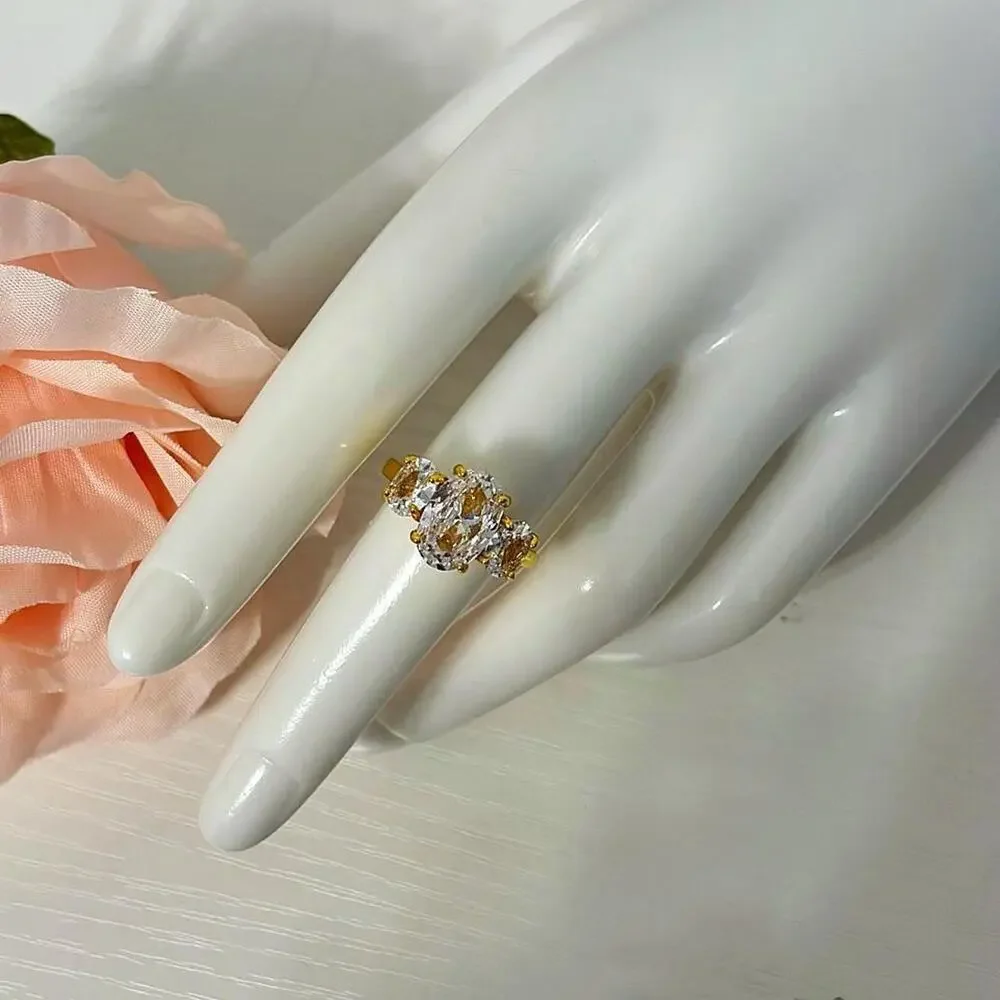 18k gold plated ring with 3 prong CZ diamonds